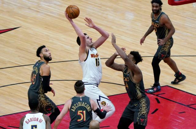 开云体育下载-约基奇两大特质与邓肯相似 马龙：他就是当代石佛